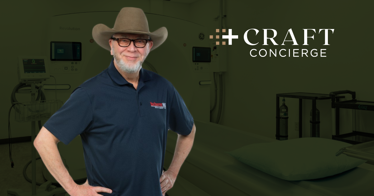 Jim "Hoot Owl" Jefferies stands in front of a CT scanner at Craft Concierge in Tulsa, Oklahoma.