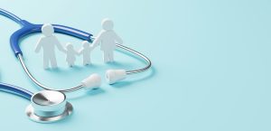 A stethoscope with a silver chest piece and blue tubing, surrounded by white paper cutouts of a family consisting of two adults and two children, set against a light blue background.